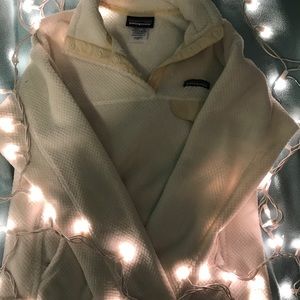 Small white Patagonia fleece pullover